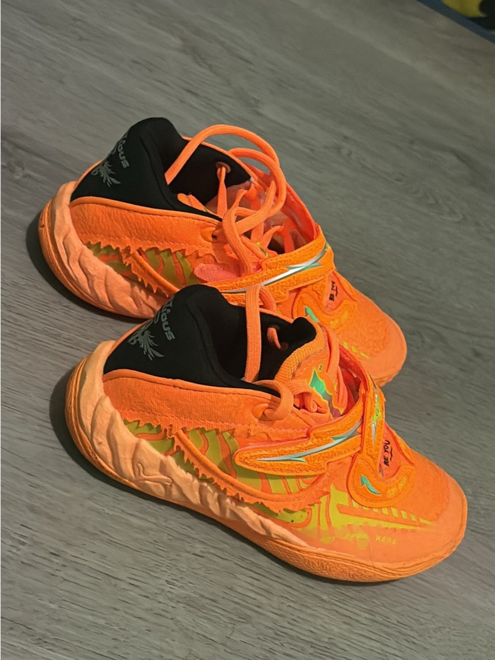 Puma Kids Neon Orange and Black Athletic Sneakers